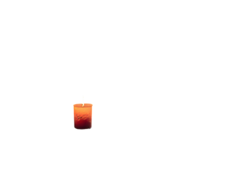 Orange candle flame floating in dark water isolated on a transparent background light