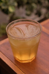Ocha ice on wooden table. Ocha is a traditional green tea from Japan.