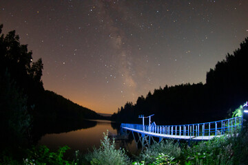 Photos of the real Milky Way over a lake.