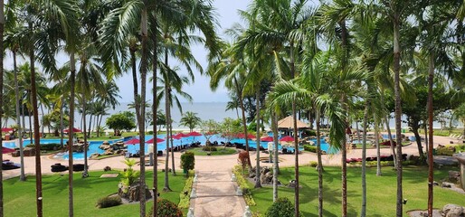 Tropical beach with palm trees at Bintan Island, Indonesia