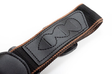 Black fabric strap for electric or acoustic guitar.