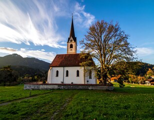 Scenic church in a valley at sunset
