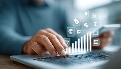 Person using laptop, digital icons overlay