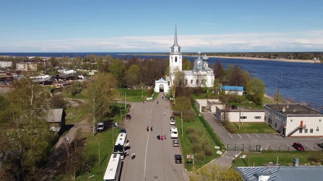 Aerial view of Staraya Ladoga, Russia riverside church with its white walls, silver dome