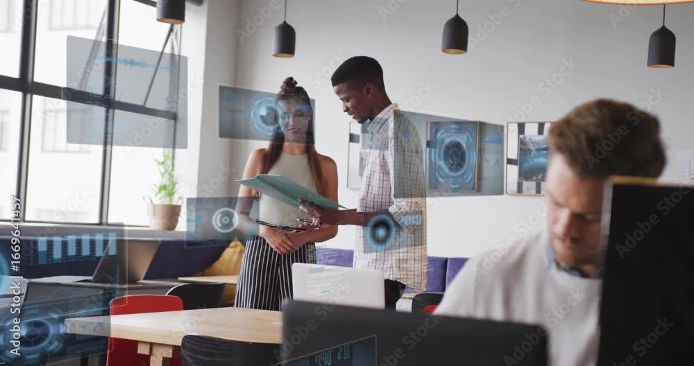 Poster man handing folder to colleague activating business hologram charts and code while coworker typing