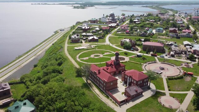 Drone shot of Sviyazhsk island town with red-roofed buildings near the Volga River