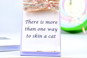 There is more than one way to skin a cat text the inscription on the calendar with tear-off leaves