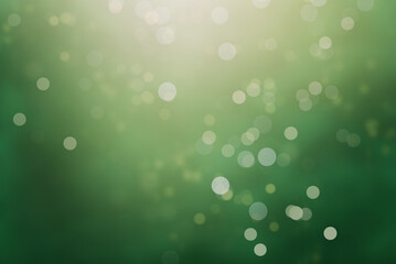 green blurred background with defocused lights or bokeh