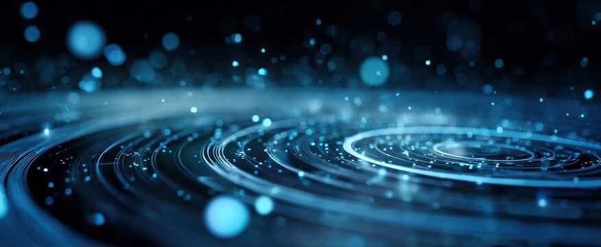 The glowing concentric digital rings and particles on a futuristic blue circuit surface