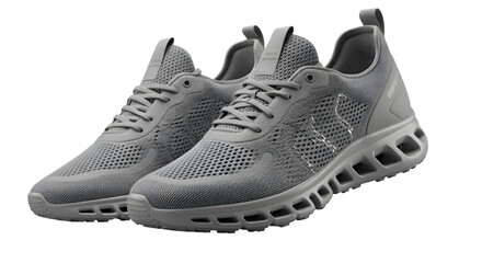 Gray athletic sneakers with mesh texture shine on a dark surface. Suitable for product photography or fashion branding.