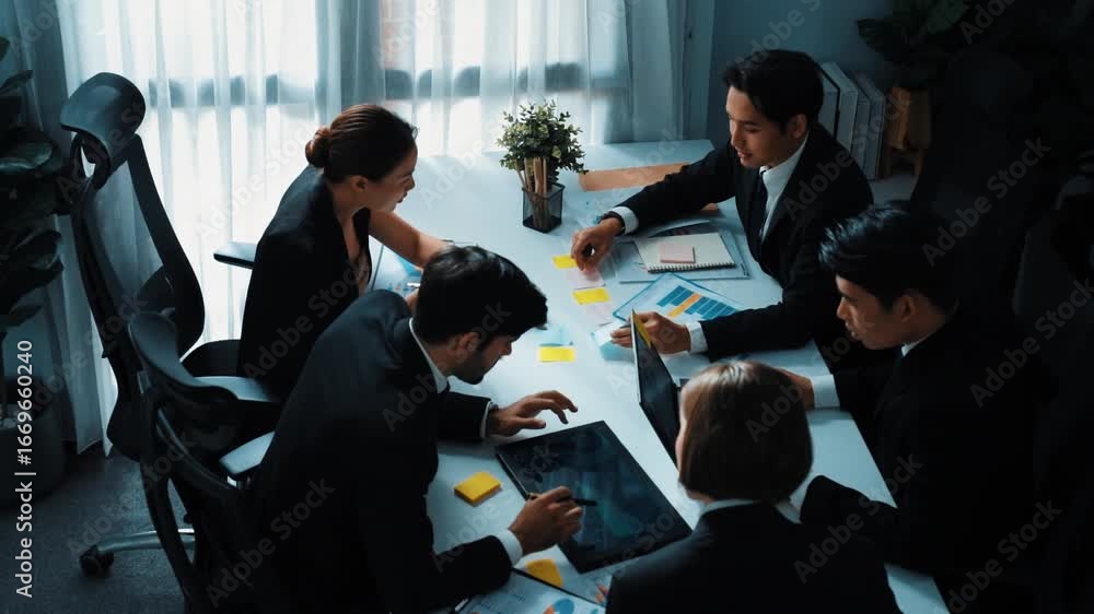Aufkleber top view of professional business people looking at financial chart from tablet while diverse group 