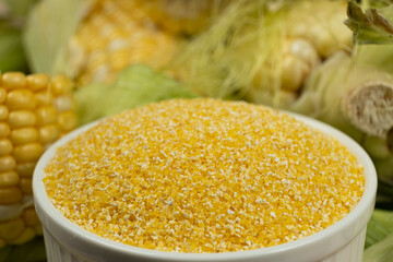 Close-up of raw uncooked gluten-free corn grits.