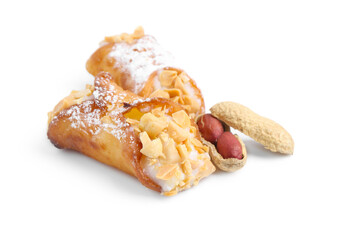 Delicious cannoli with ricotta cheese, peanuts and powdered sugar isolated on white