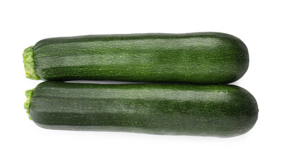 Fresh ripe zucchinis isolated on white, top view
