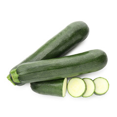 Whole and cut fresh zucchinis isolated on white, top view