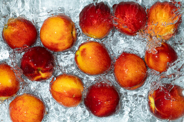 Fresh Peaches in Water. Top View Composition with Water Movement.