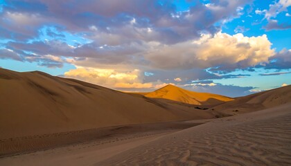 Golden Hour Desert Landscape with Dramatic Clouds and Sand Dunes