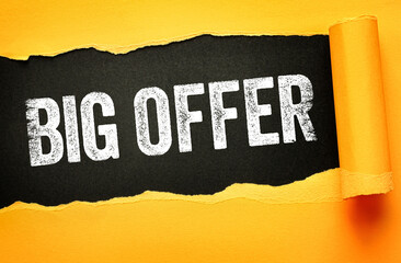 BIG OFFER text emerges from torn yellow paper revealing a black background. Eye-catching graphic...