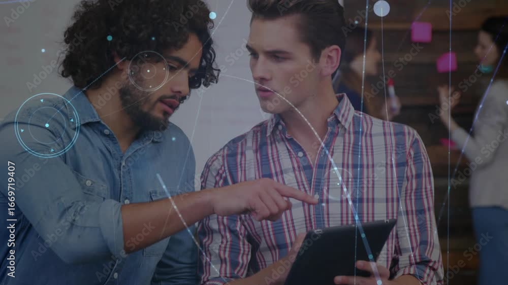 Aufkleber colleagues tapping tablet to analyze business data in office generating animated data overlays