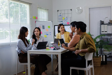 Group of Asian business people teams meeting working together in modern office working design...