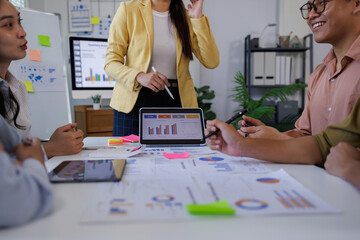 Team of business asian or accountant hand holding pen working on calculator to calculate business...