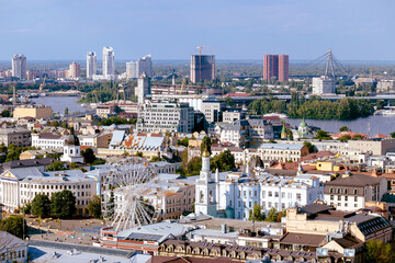 Kyiv Ukraine capital top aerial drone view city scape Ferris Wheel buildings modern architecture...