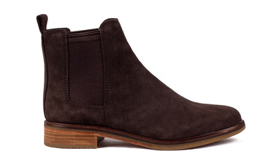 A brown boot with a brown sole