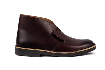 A brown shoe with a black sole