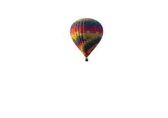 Fototapeta premium Isolated hot air balloon floating in the sky for recreation and adventure travel fun