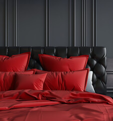 Luxurious red bedding on a black leather bed in a dark room.