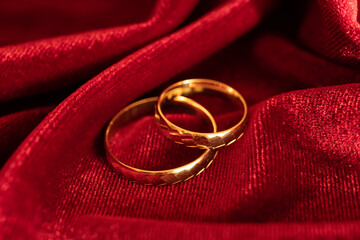 gold wedding rings on canvas for a linen wedding, linen, coral wedding