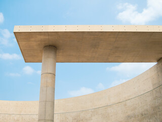 Architecture details Cement column Curve concrete wall Modern building space Art background