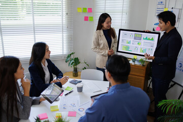 diversity asian team discussion focused and talk ESG strategies risk,environment,social,governance...