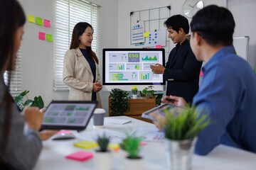 diversity asian team discussion focused and talk ESG strategies risk,environment,social,governance...