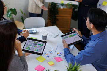 diversity asian team discussion focused and talk ESG strategies risk,environment,social,governance for net zero goals in a sustainable green office