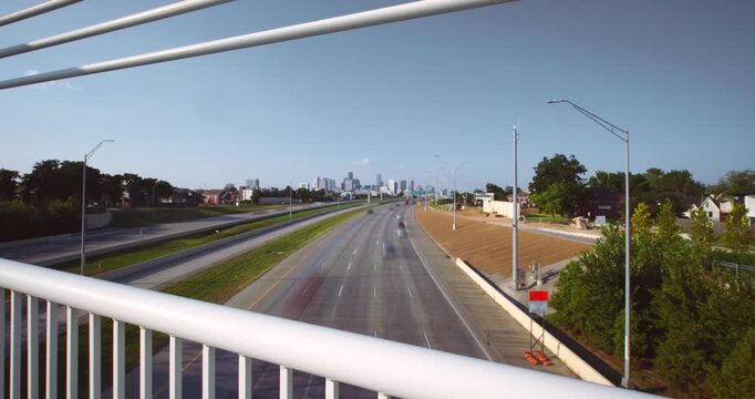 Wide angle view Downtown Houston Skyline with 288 Freeway Traffic
