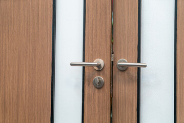 Obraz premium Modern Wooden Door with Glass Panel Design