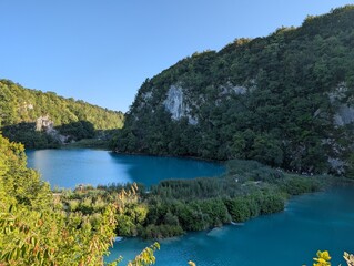 Obraz premium Plitvice Lakes with Clear Blue Water and Lush Forests