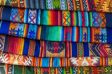 Traditional native Andes textiles, Otavalo art and craft market, Ecuador.