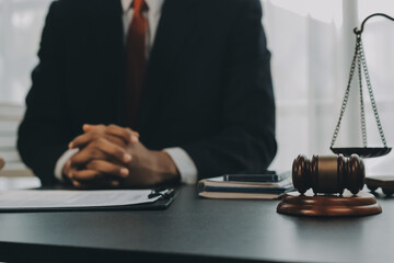 Lawyer explained to the client about the law that must be brought against the court case.