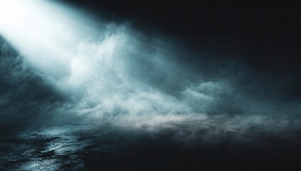 Obraz premium Dramatic bright light beam cutting through dark misty clouds creating an ethereal and mysterious atmosphere