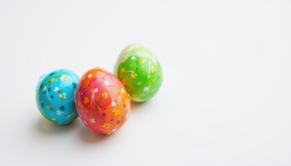 Fototapeta premium colorful easter eggs on white background subject on left, copy space on right, optimized for photo use.