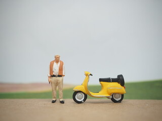 Mini toy of action figure at table with blurred background. Business photography concept design....