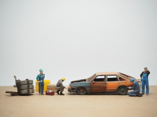 Mini toy of action figure at table with blurred background. Miniature photography concept design....