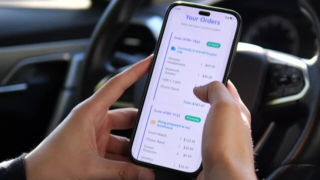 A man's hands review a consolidated list of all active shipments and their current statuses on a phone. This video is essential for content about e-commerce management, order fulfillment, and multi