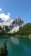 Mountain lake reflection, summer alpine scene