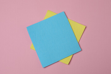 cleaning sponges on a pink background
