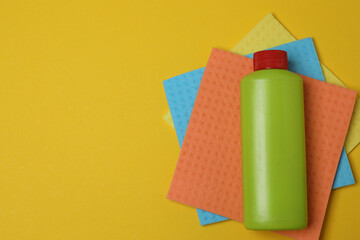 cleaning sponges on a yellow background

