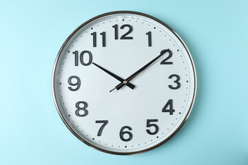 wall clock on a blue background