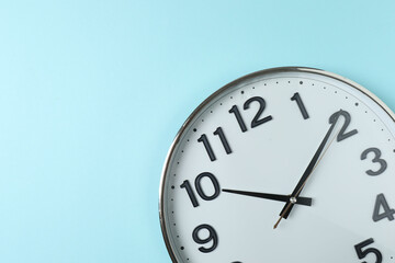 wall clock on a blue background